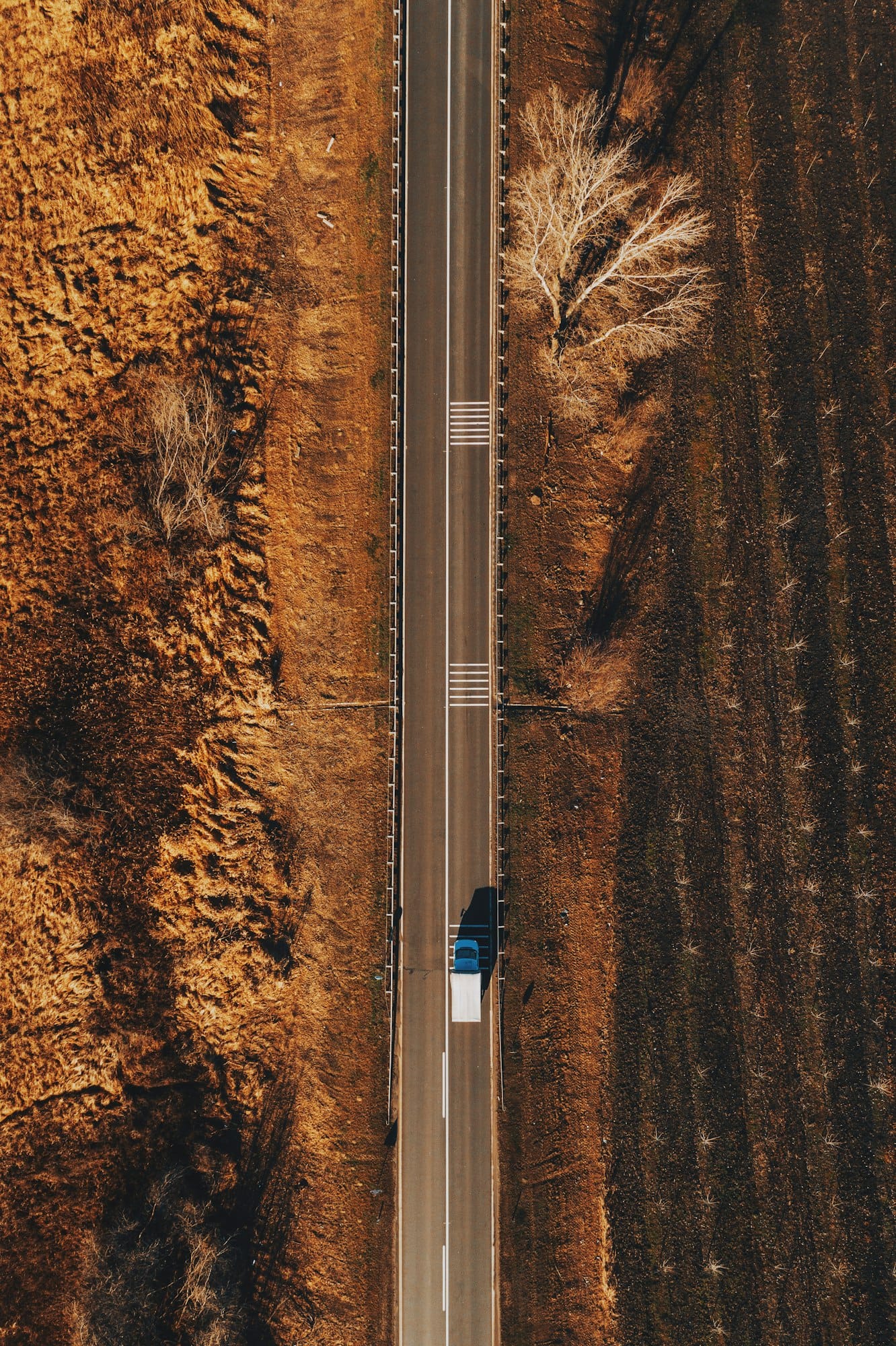 Mini truck on the road from above