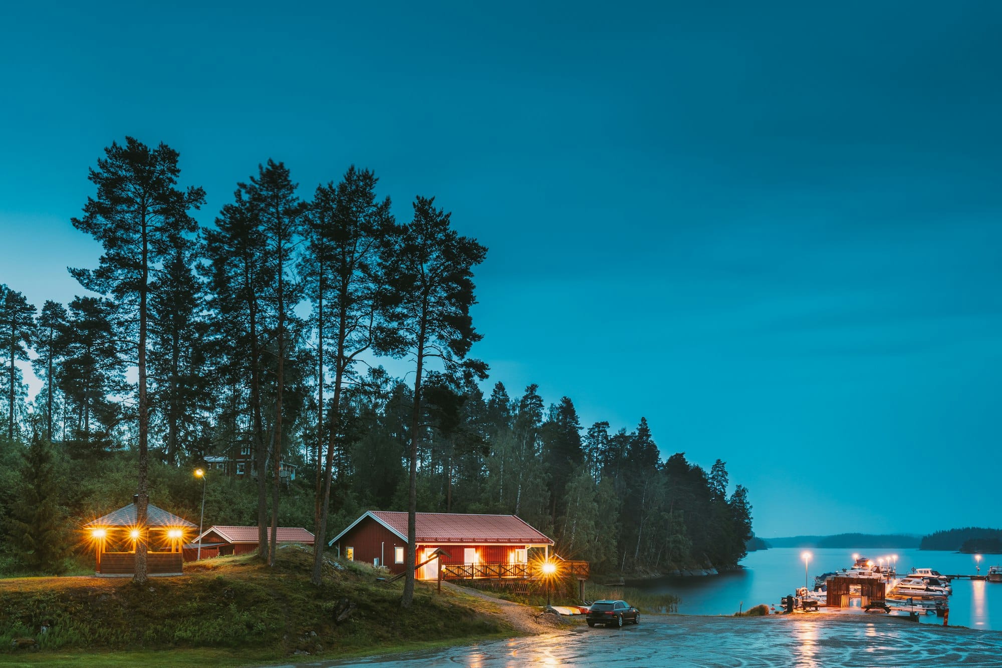 Sweden Beautiful Red Swedish Wooden Log Cabin House On Rocky Island Coast